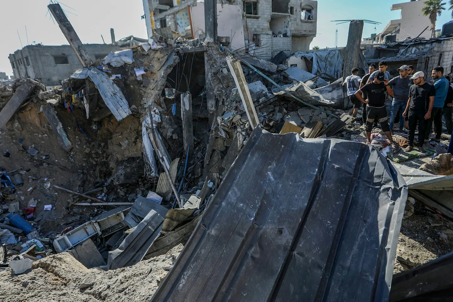 War-damaged Gaza building collapses, killing 16 people seeking shelter inside - report