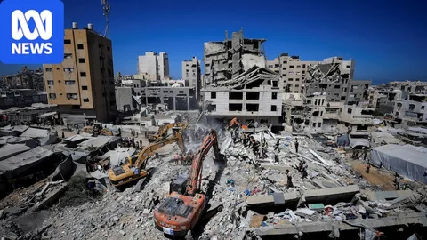At least 20 dead, including children, as war-damaged building collapses in Gaza