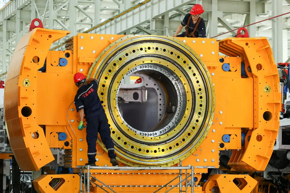 Chinese factory activity contracts in August despite a slight improvement | AP News